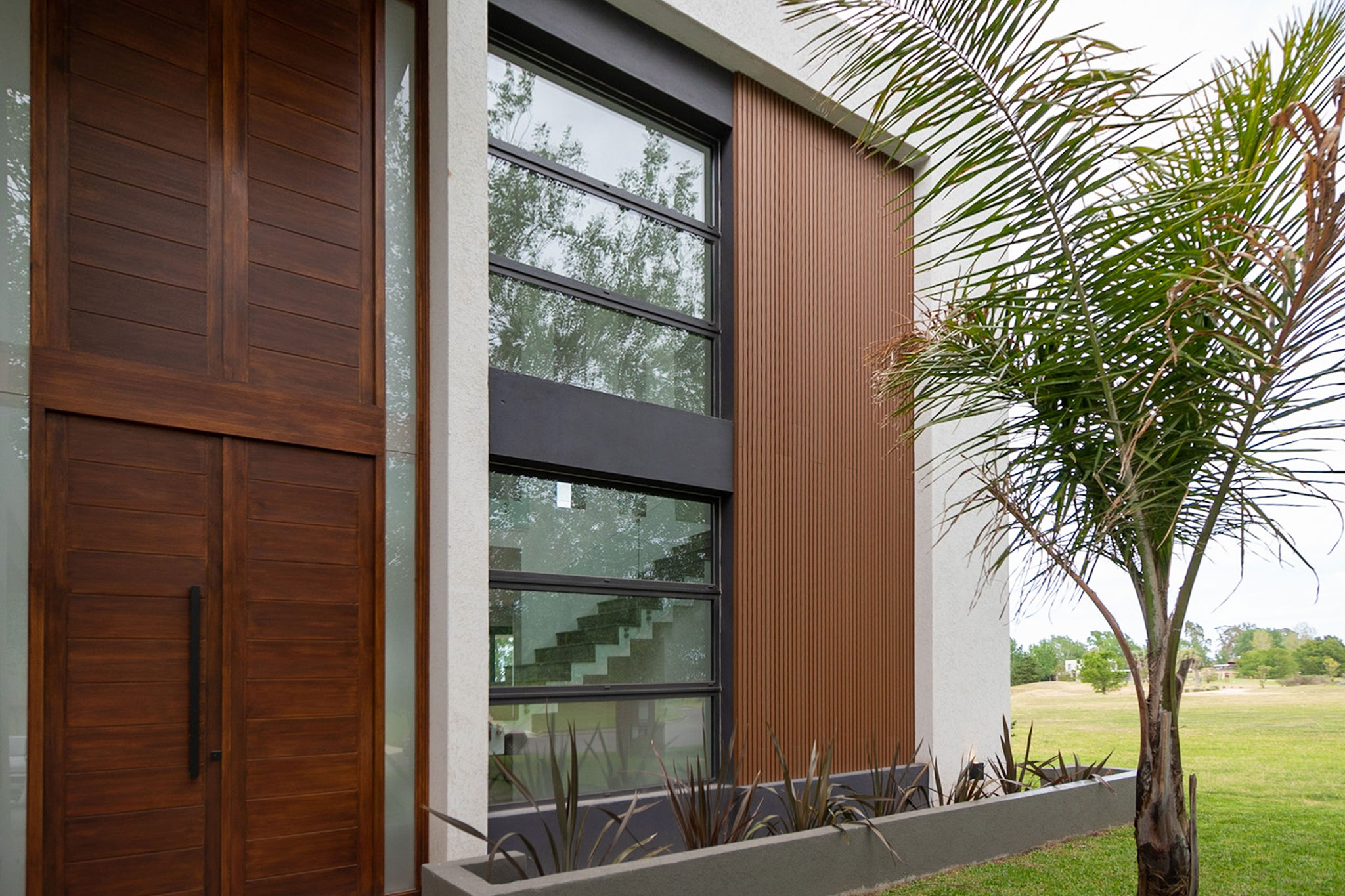 Fachada de casa moderna con revestimiento de pared Wall Panel WPC